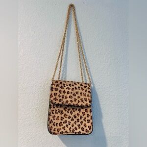St Maarten Leopard Print Crossbody Bag with Gold Chain.